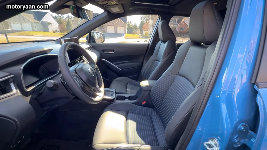 Toyota Corolla Cross Hybrid front cabin dashboard steering wheel front seats