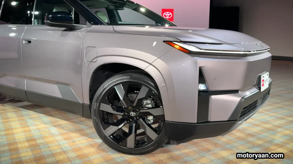 2027 Toyota Highlander EV 22 inch alloy wheel and front fender detail