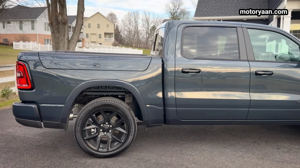 2026 Ram 1500 Laramie truck bed side view with rear wheel and body lines