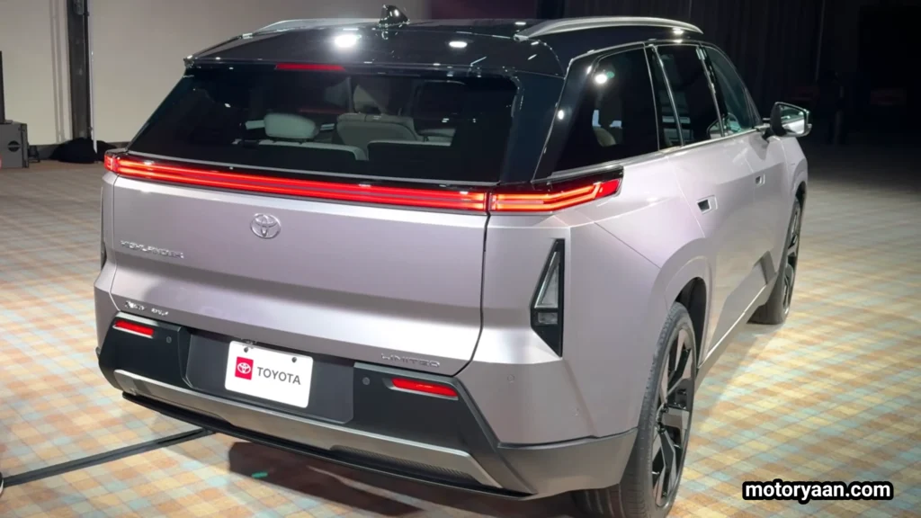 2027 Toyota Highlander EV rear three quarter angle showing LED tail lights