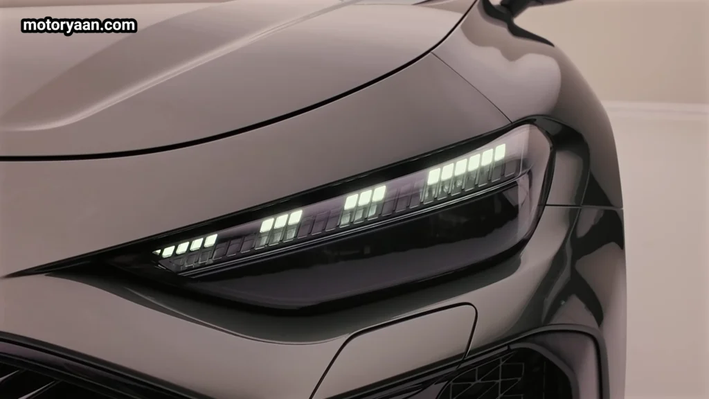 2026 Audi RS5 sedan Matrix LED headlight close up with dark background finish