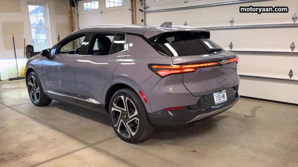 Rear three quarter view of the 2026 Chevrolet Equinox EV LT showing LED tail light bar