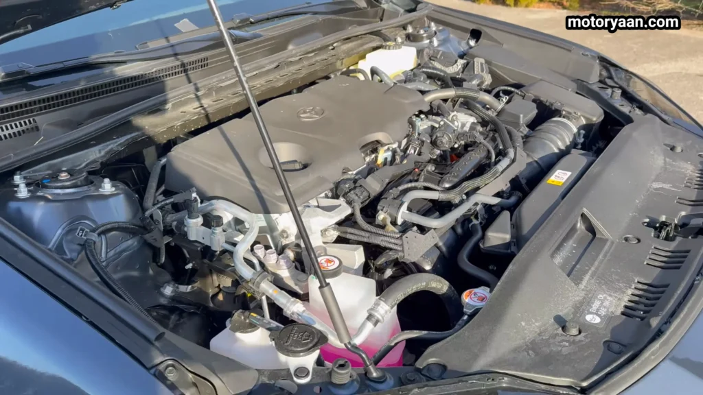 2026 Toyota Camry Hybrid engine bay with hybrid powertrain