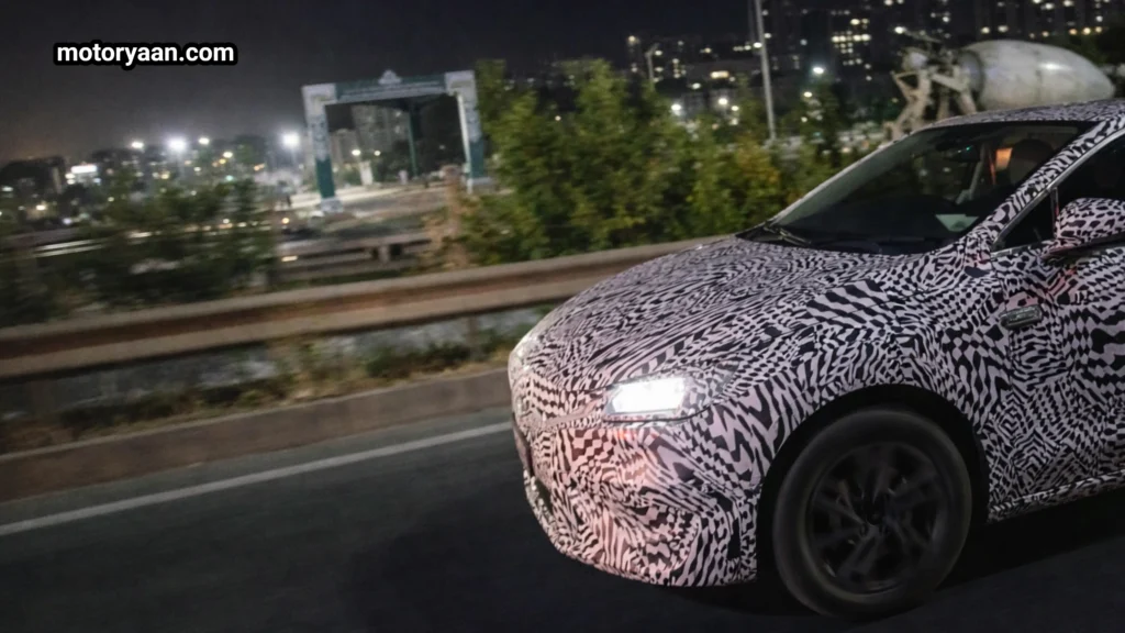 2027 Skoda Slavia Facelift front profile showing redesigned grille LED headlamps and sculpted front fender during road testing
