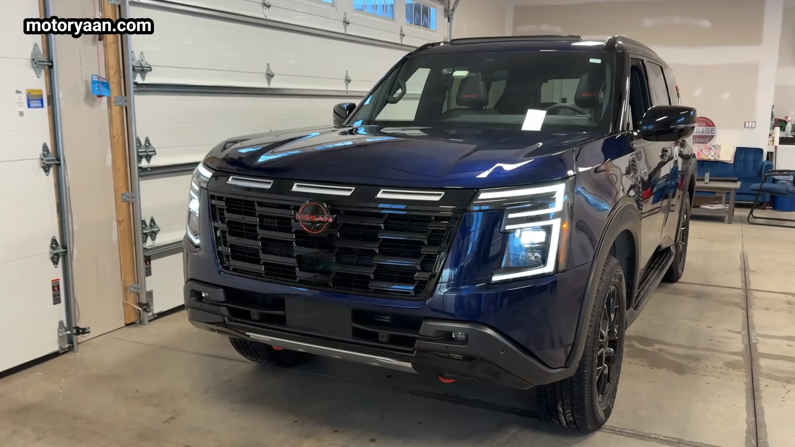 2026 Nissan Armada Pro 4X front three quarter view showing rugged body on frame SUV design