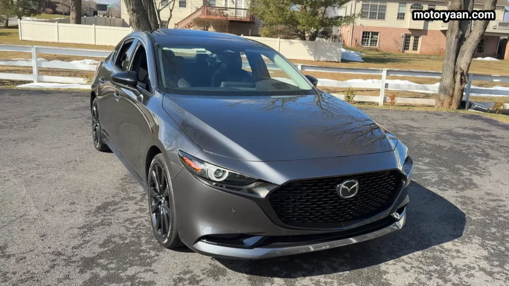2026 Mazda 3 2.5 Turbo Premium Plus front three quarter view showing grille and side profile