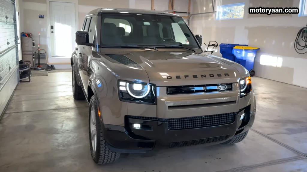 2026 Land Rover Defender 110 X Dynamic SE front three quarter view showing LED headlights and rugged stance