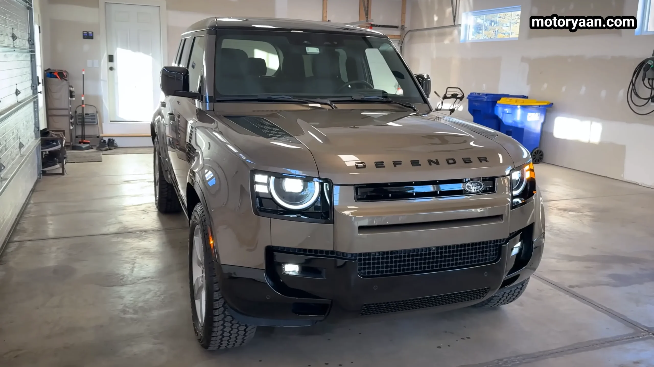 2026 Land Rover Defender 110 X Dynamic SE front three quarter view showing LED headlights and rugged stance
