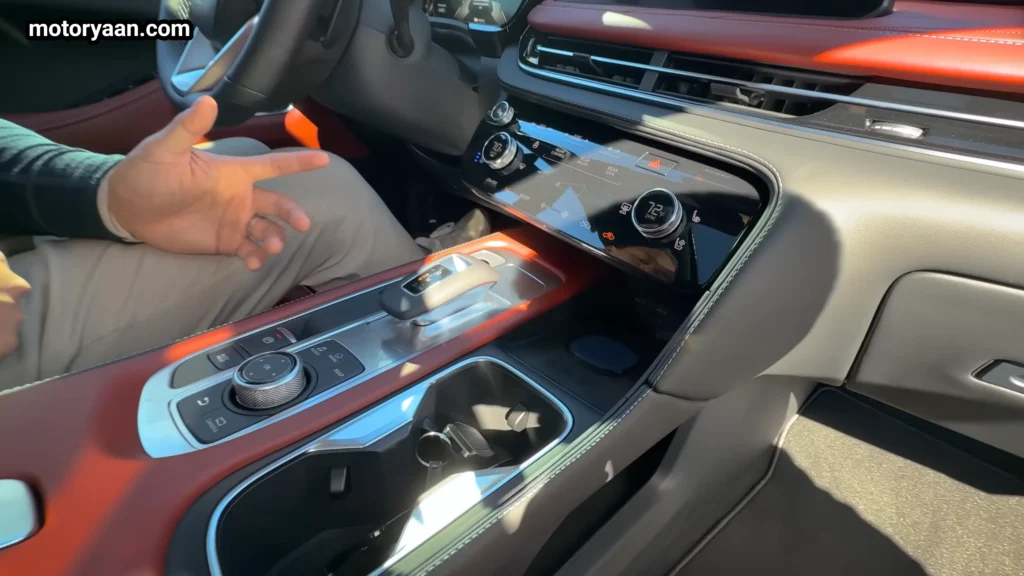 2027 Infiniti QX65 center console with gear selector cup holders and climate controls