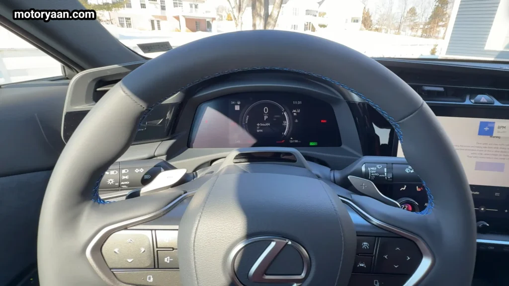 2026 Lexus RZ 550e F Sport steering wheel and infotainment display
