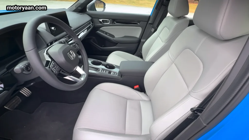 2026 Honda Civic Hybrid Hatchback front seats dashboard and center console interior