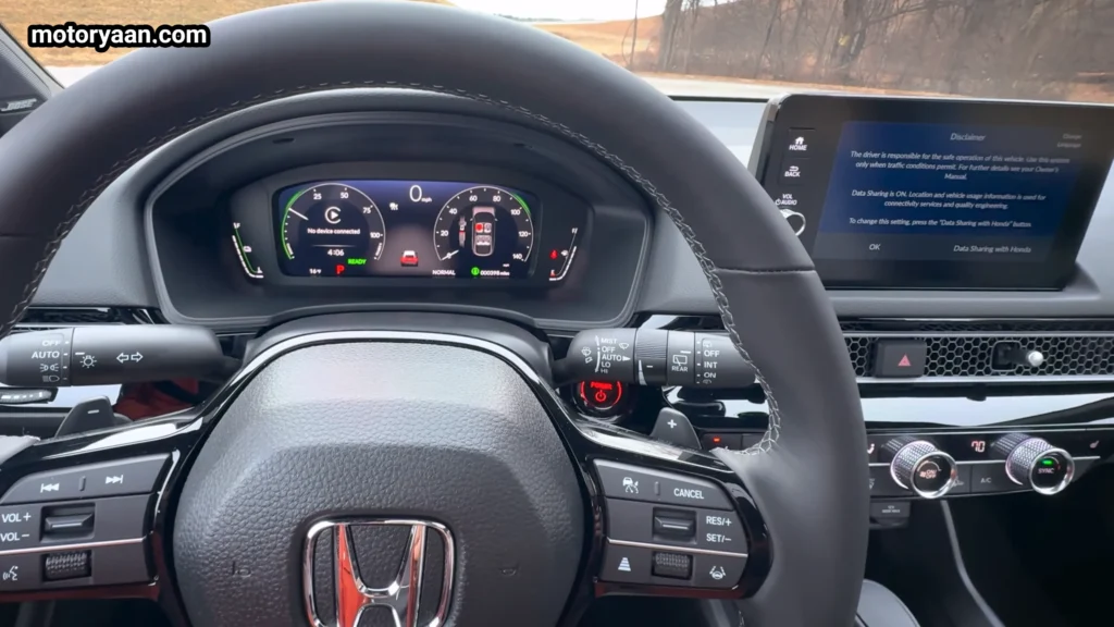 2026 Honda Civic Hybrid Hatchback digital instrument cluster close up