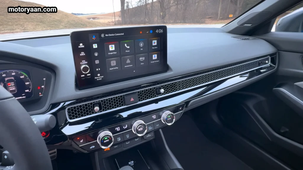 2026 Honda Civic Hybrid Hatchback infotainment screen and climate control panel