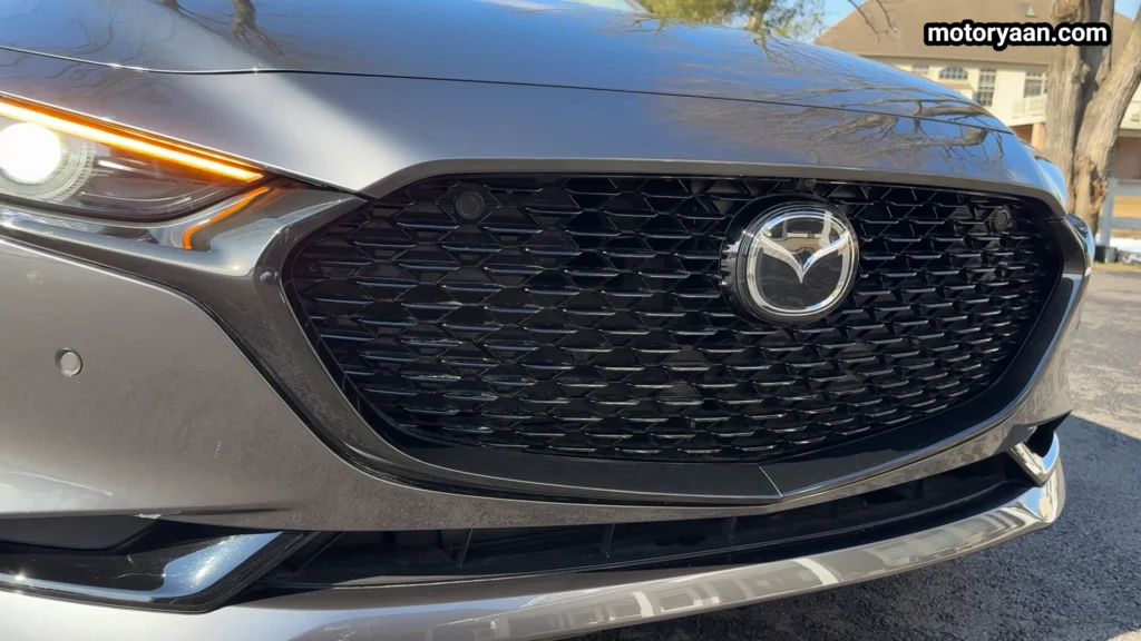 2026 Mazda 3 Turbo Premium Plus close up of front grille and LED lighting detail