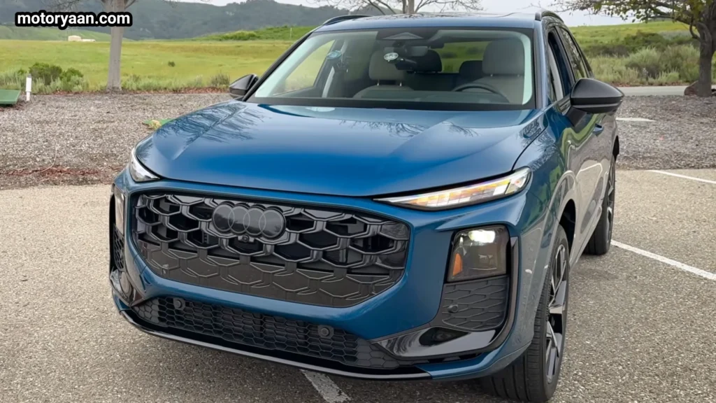 2026 Audi Q3 front view with partial side profile showing redesigned front end styling