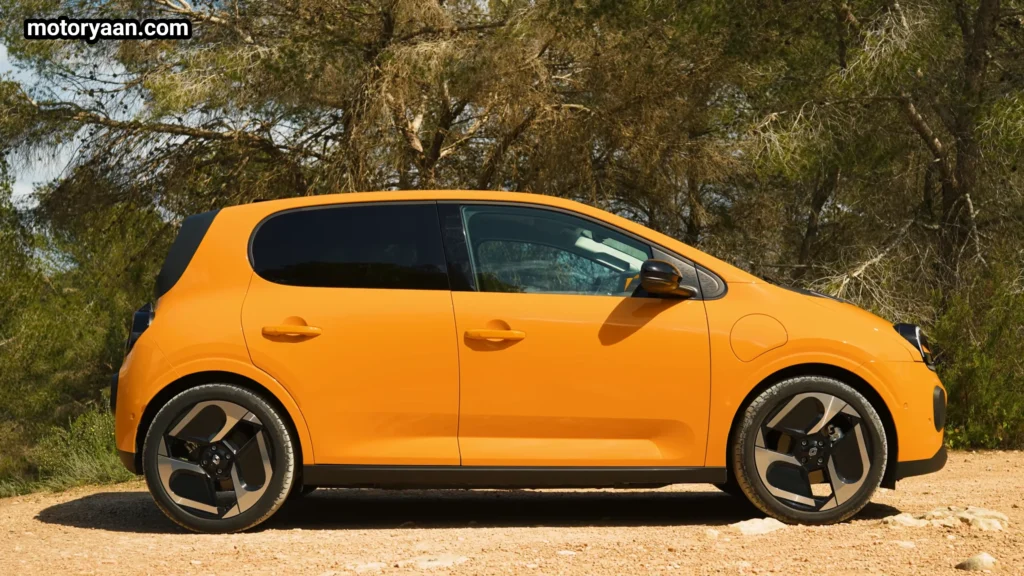 Renault Twingo EV full side profile with compact city car proportions