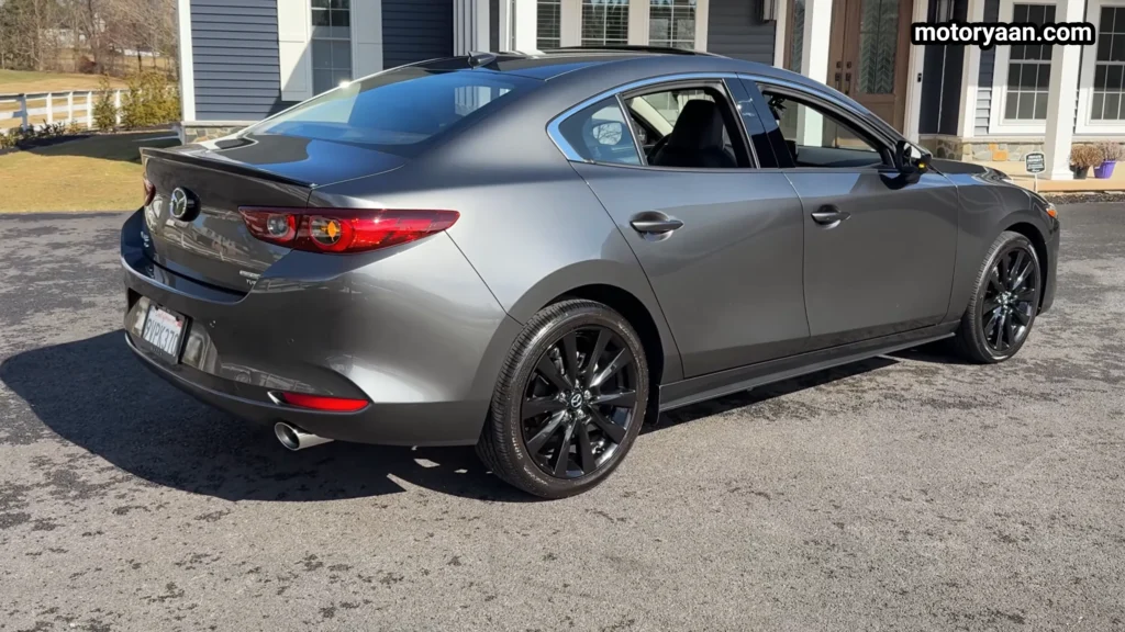 2026 Mazda 3 Turbo Premium Plus rear three quarter view showing side and rear design