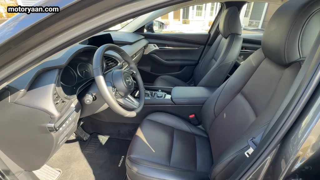 2026 Mazda 3 Turbo Premium Plus front interior with leather seats and dashboard layout