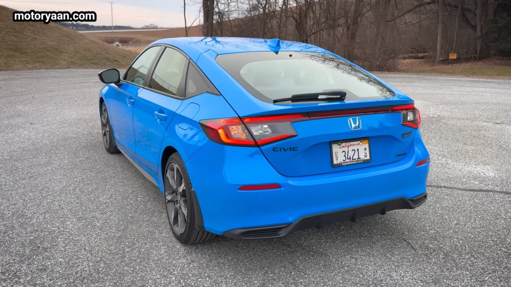 2026 Honda Civic Hybrid Hatchback side and rear three quarter view