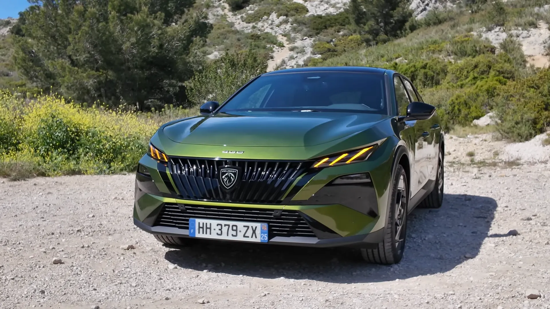 2026 Peugeot 408 Facelift front profile with LED DRLs, grille and sleek fastback stance