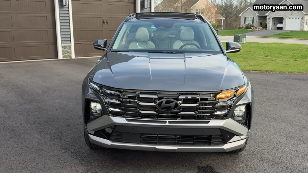 2026 Hyundai Tucson Hybrid front profile with LED DRLs and bold grille design