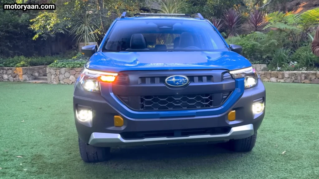 2027 Subaru Forester Wilderness Hybrid front profile with rugged grille and LED headlights