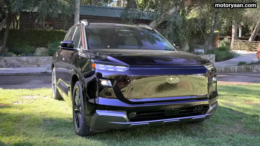 2027 Subaru Getaway Touring front three quarter view with LED DRLs and muscular SUV stance