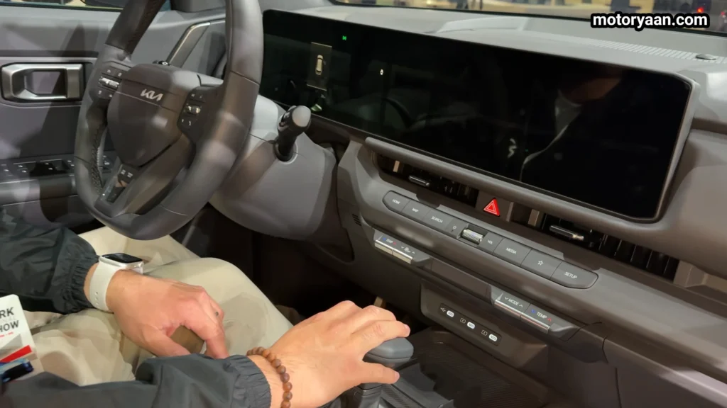 2027 Kia Seltos X Line dashboard with dual screens steering wheel and climate controls