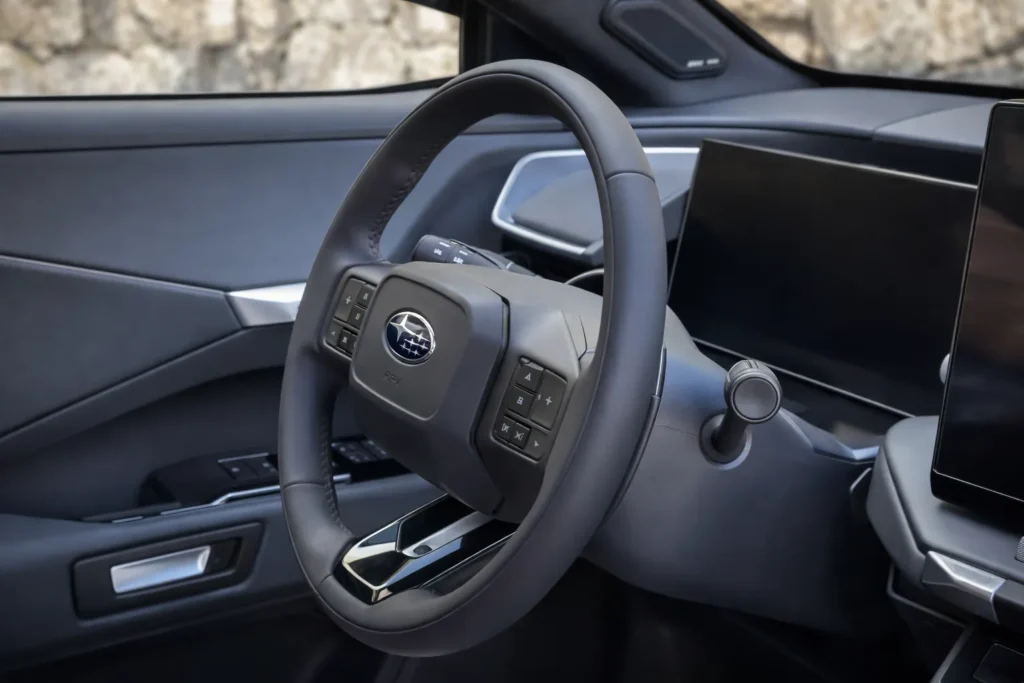 2027 Subaru Getaway Touring steering wheel with mounted controls and digital interface