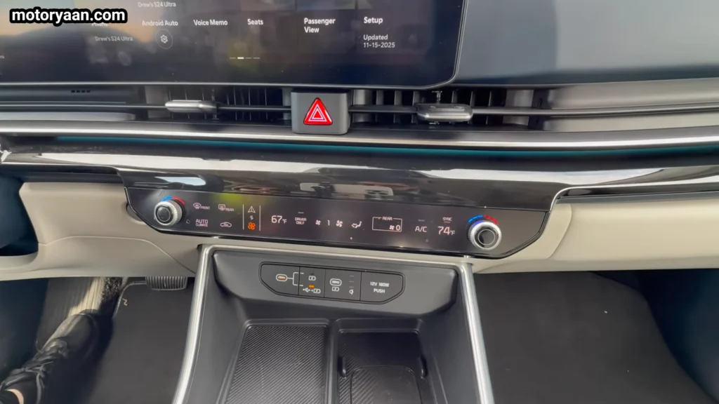 2026 Kia Carnival climate control panel with three zone automatic AC system