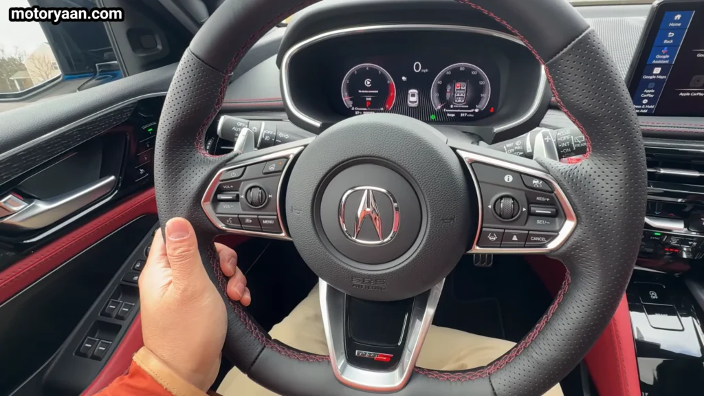 2026 Acura MDX Type S steering wheel with mounted controls and paddle shifters