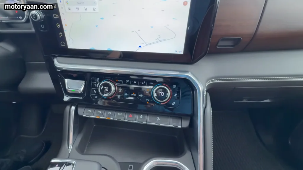 2026 GMC Sierra 1500 Denali Ultimate climate control panel with physical buttons and toggles