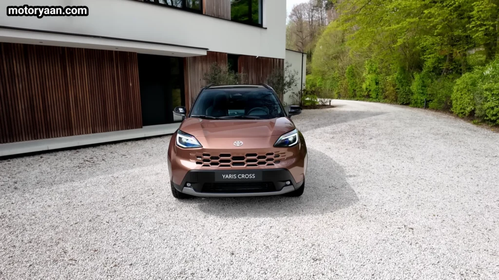 2026 Toyota Yaris Cross front profile with LED headlamps and honeycomb grille
