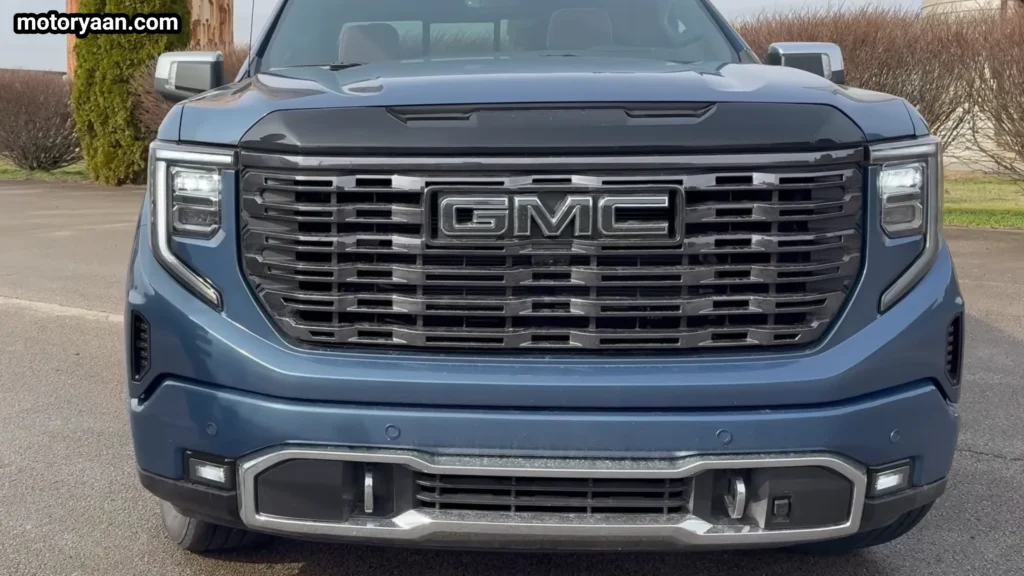 2026 GMC Sierra 1500 Denali Ultimate front grille close up with LED headlights