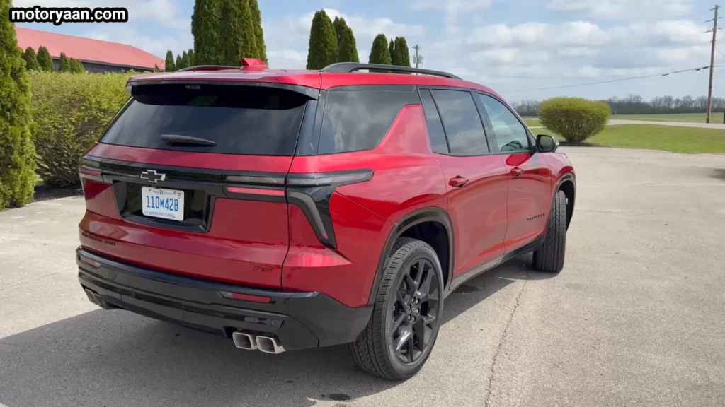 2026 Chevrolet Traverse side and rear three quarter view showing long body and alloy wheels