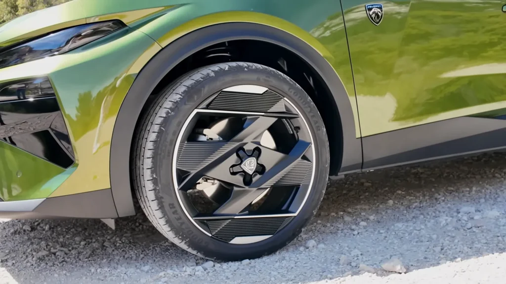 2026 Peugeot 408 Facelift alloy wheel close up with multi spoke design and sporty finish