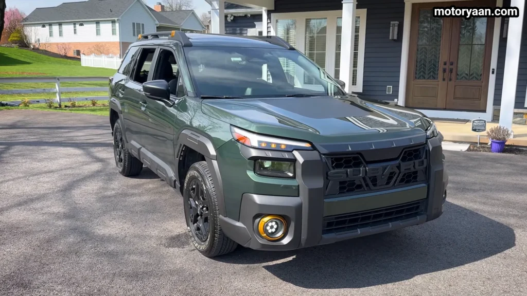2026 Subaru Outback Wilderness front three quarter view showing side cladding