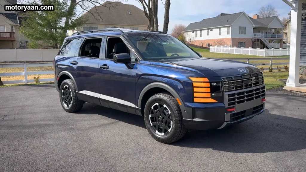 2026 Hyundai Palisade XRT Pro side profile with lifted suspension and rugged styling