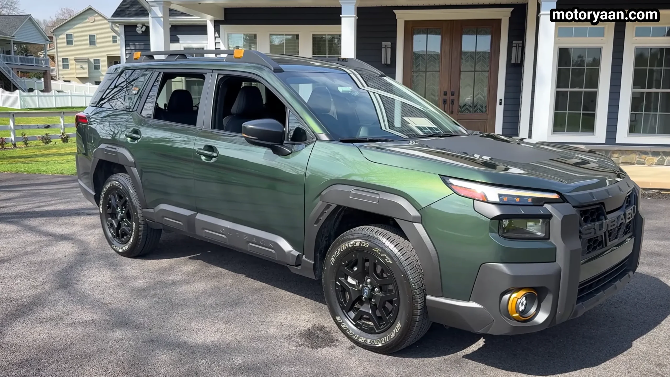 2026 Subaru Outback Wilderness full side profile with roof rails and ground clearance