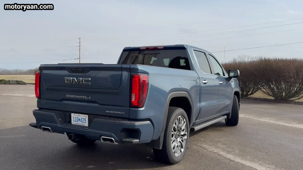 2026 GMC Sierra 1500 Denali Ultimate side rear three quarter view with LED tail lamps