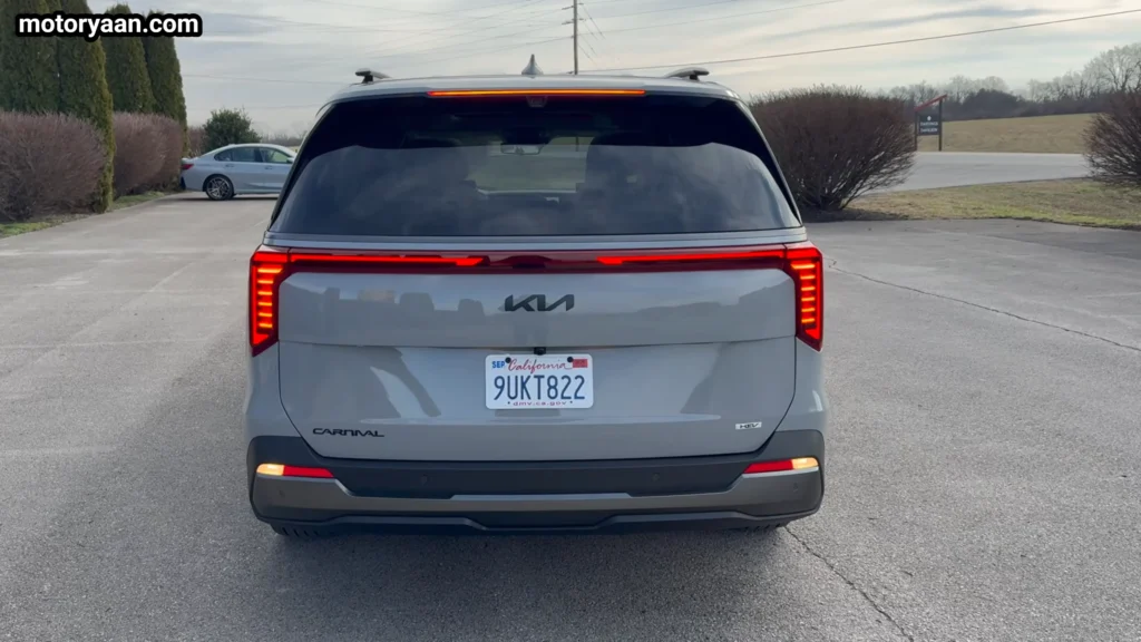 2026 Kia Carnival rear design close up showing LED light bar and badging