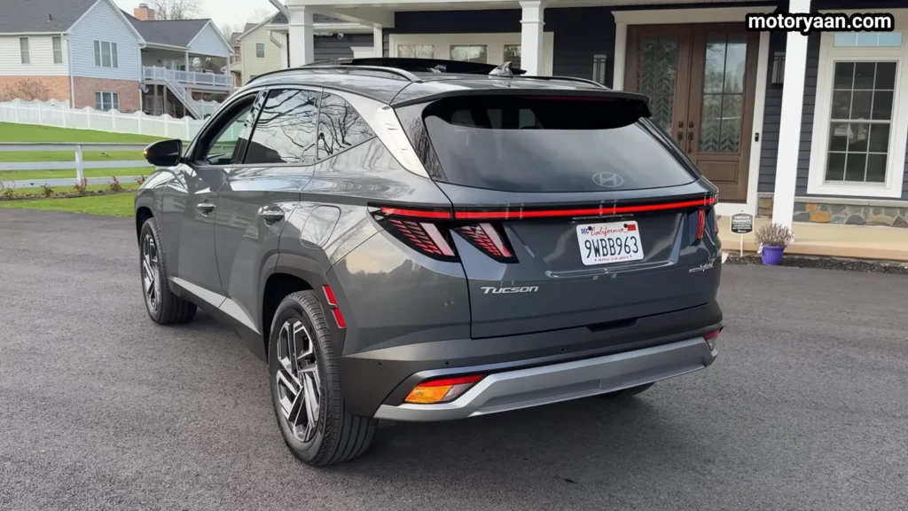 2026 Hyundai Tucson Hybrid rear three quarter view with LED light bar