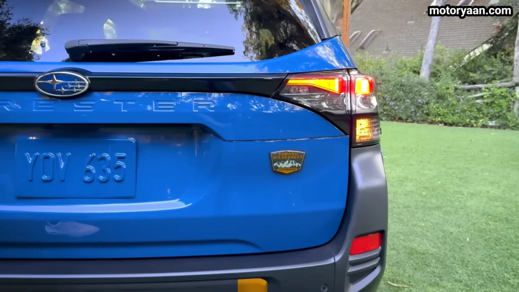 2027 Subaru Forester Wilderness Hybrid tail light close up with Wilderness badge on tailgate