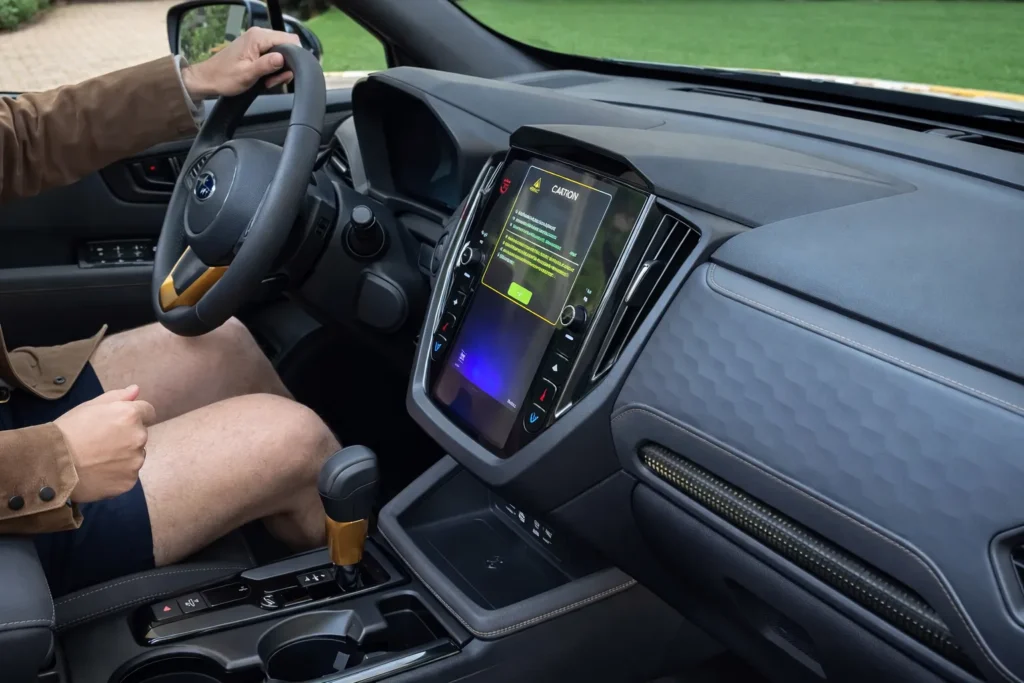 2027 Subaru Forester Wilderness Hybrid interior dashboard steering wheel infotainment system and center console